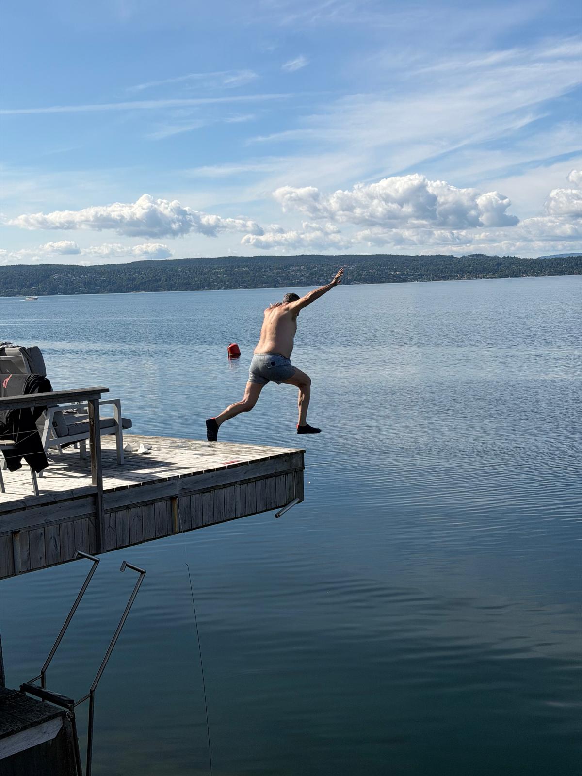 Jumping off a pier into a fjord in Oslo